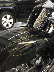motorcycle fender dent repaired